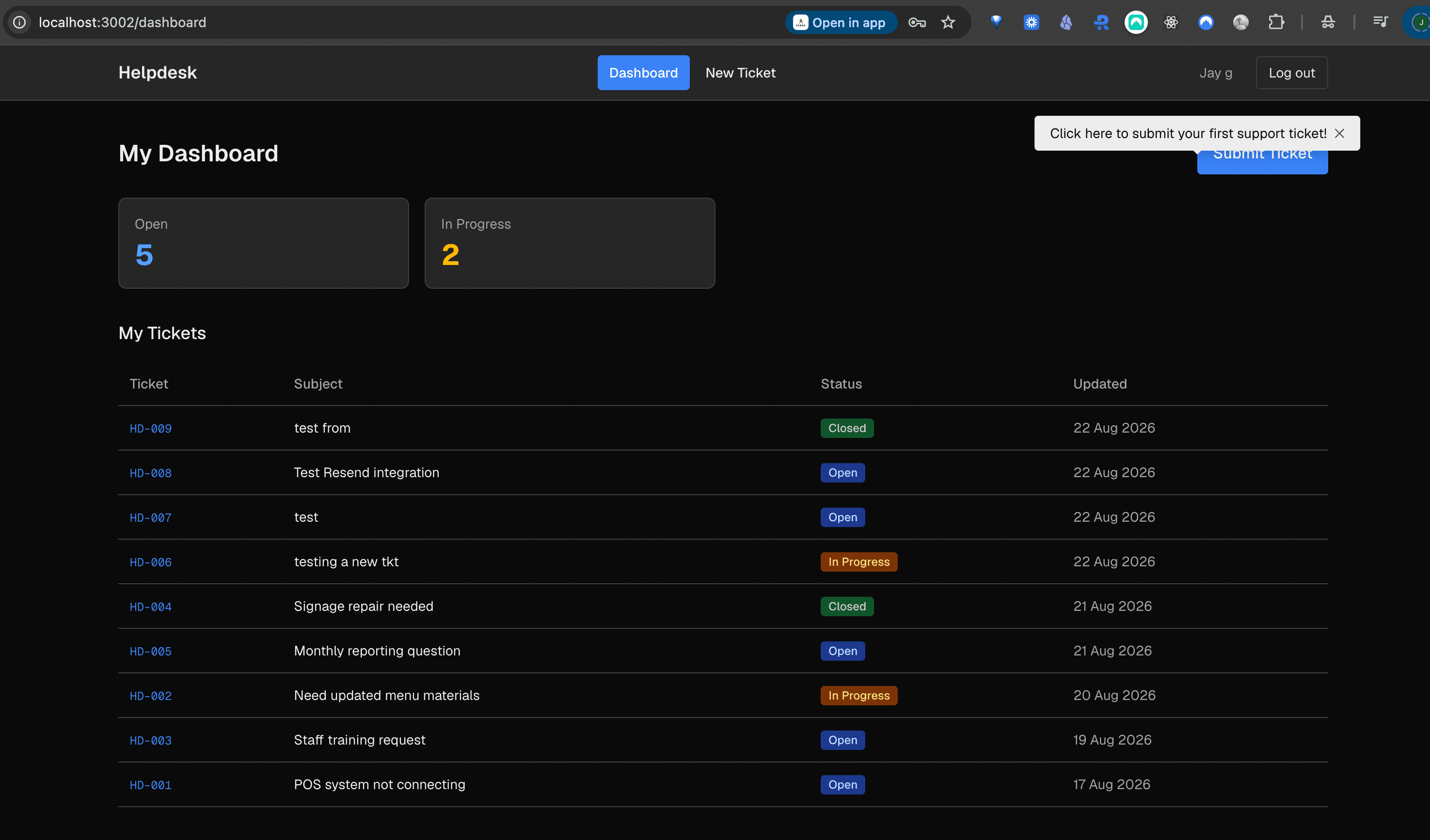 Franchisee dashboard showing open and in-progress ticket counts with a ticket list.